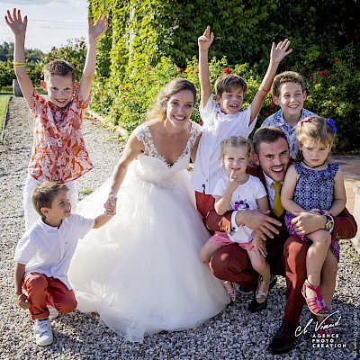 Reportage mariage - Photo des mariés avec tous les enfants